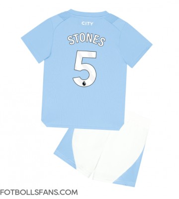 Manchester City John Stones #5 Replika Hemmatröja Barn 2023-24 Kortärmad (+ Korta byxor)